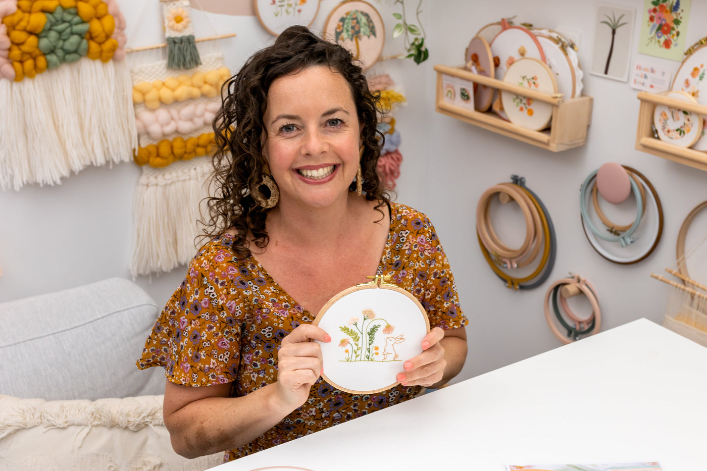 Julie Stuart holding embroidery hoop